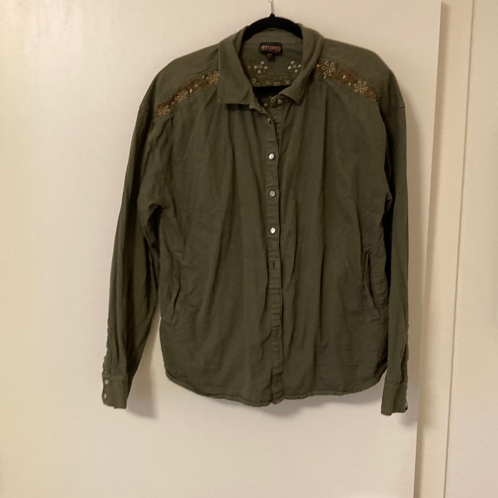 Green canvas over blouse, can be a light coat.